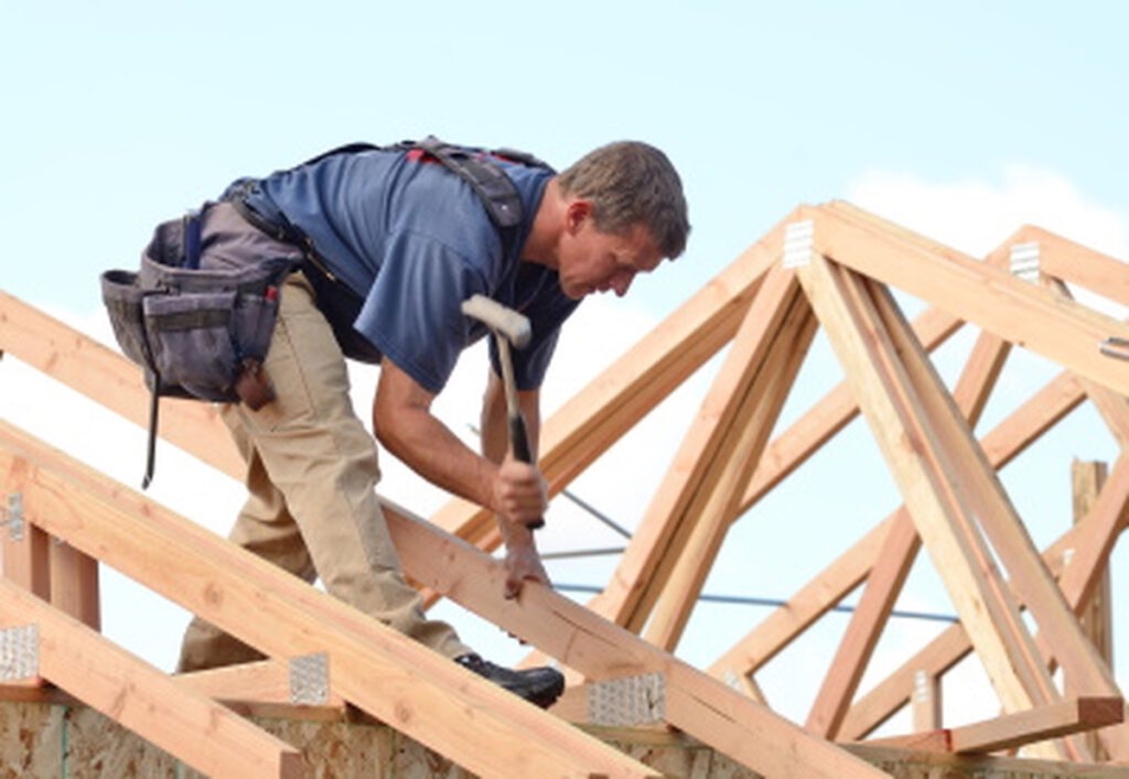 Layout and installation of roof rafters on a new commercial residential construction project by framing contactors, CK Contracting, Custom Home Build, Mt. Pleasant, SC